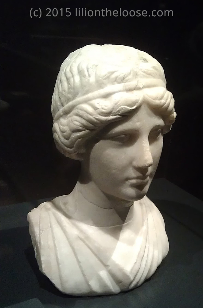 A statue of a woman from Pompeii 