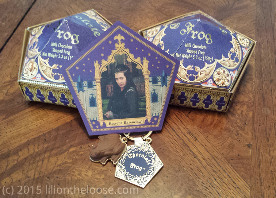 A Rowena Ravenclaw trading card, Chocolate Frog boxes, and a Chocolate Frog keychain.